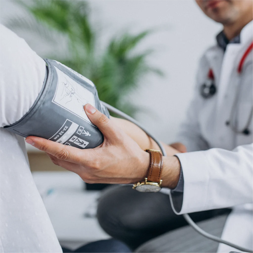 Doctor checking for BP